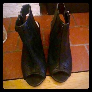 Heeled open-toe, open-heel sandals.